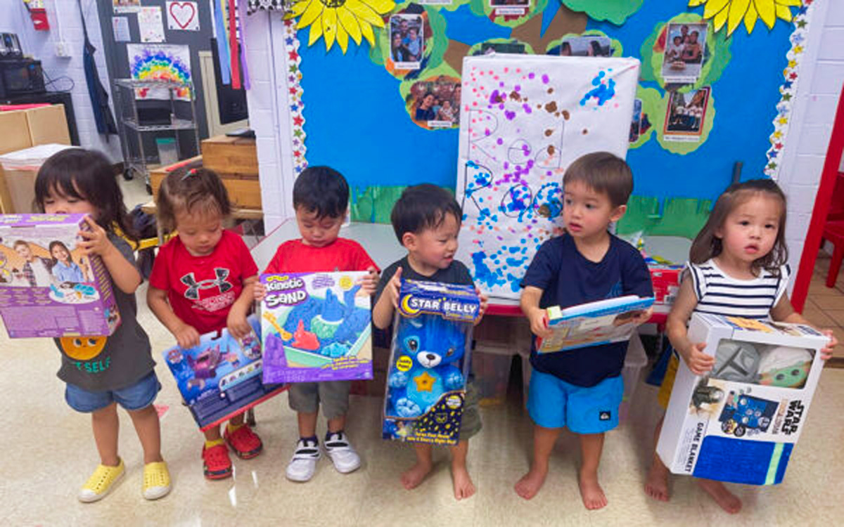 Makiki Christian Church Preschool students with donation, Honolulu