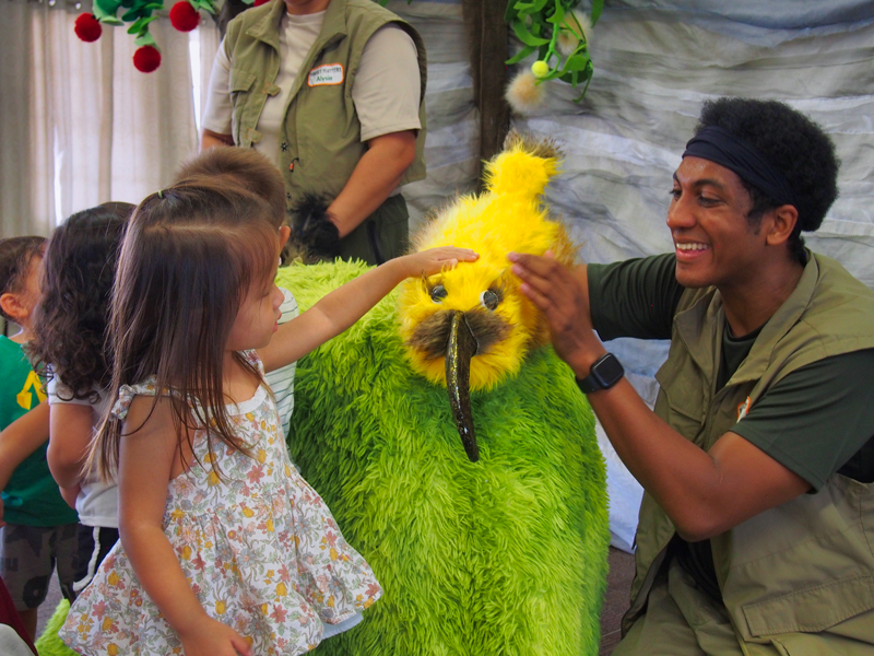 Makiki Christian Church Preschool Forest Flutters Students with bird, Honolulu